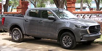 Mazda BT-50: different styling over documented Isuzu foundations.