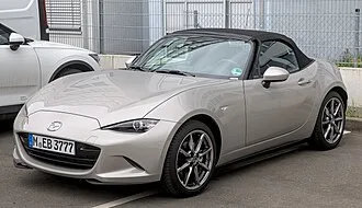 2024 Mazda MX-5 Miata: representative catalogue photo; trim and equipment may differ.