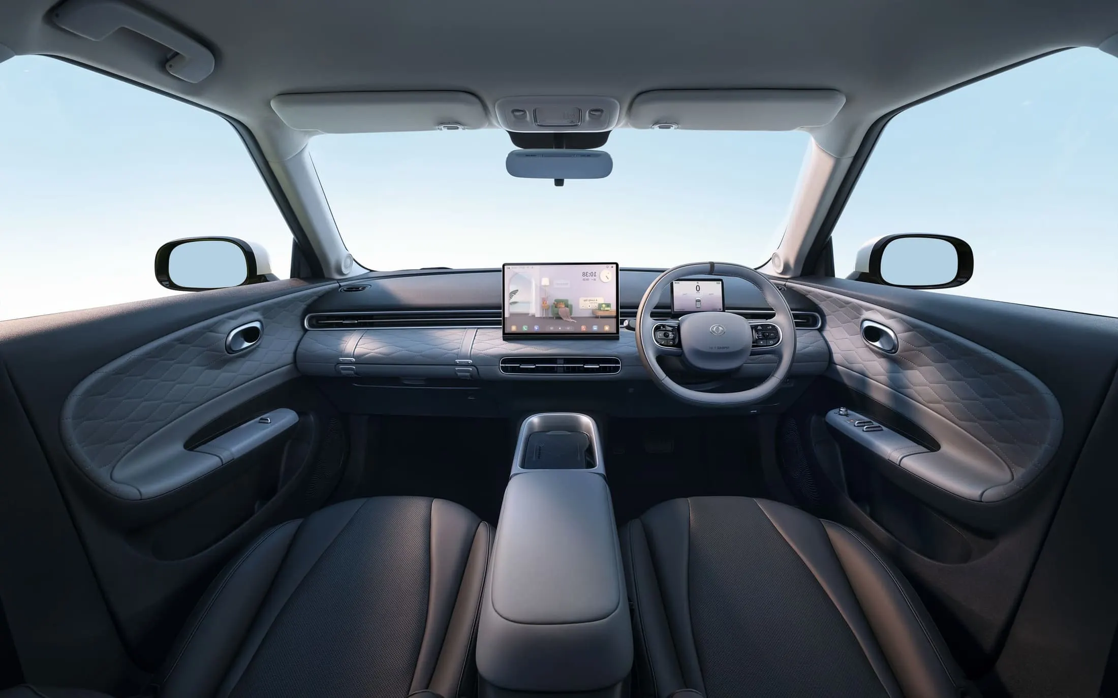 Interior of the Dongfeng Box in grey and black, right-hand drive, the trim on our cars — Dongfeng Jamaica/Bert’s Automotive. Dealer model imagery; confirm local colours and equipment.