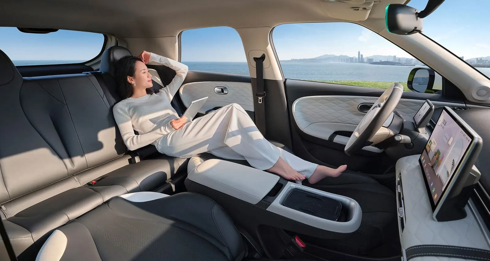 Front seat of the Dongfeng Box in rest mode — Dongfeng Jamaica/Bert’s Automotive. Dealer model imagery; confirm local colours and equipment.